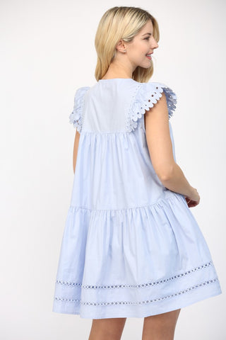 Eyelet Escape Tassel Mini Dress