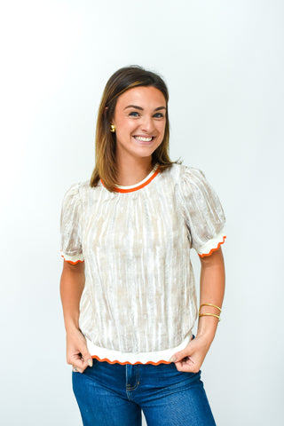 Neutral and Noticed Distressed Top