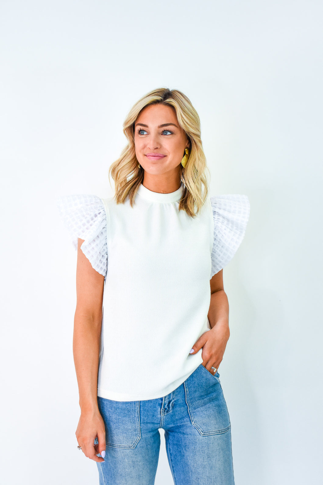 The White Of Fashion Ruffle Sleeve Top