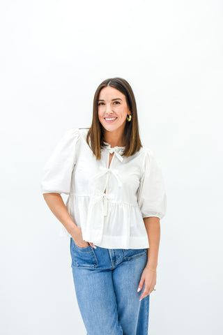 Un-Bow-Lieveable Peplum Top