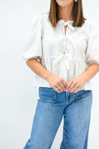 Un-Bow-Lieveable Peplum Top